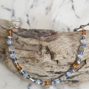 Blue, brown and crystal glass beaded bracelet